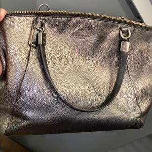 Coach bag. Needs a cleaning.